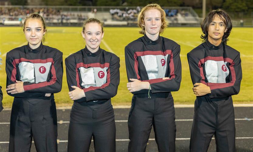 Bands perform on football field